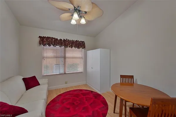 a view of a livingroom with furniture and window