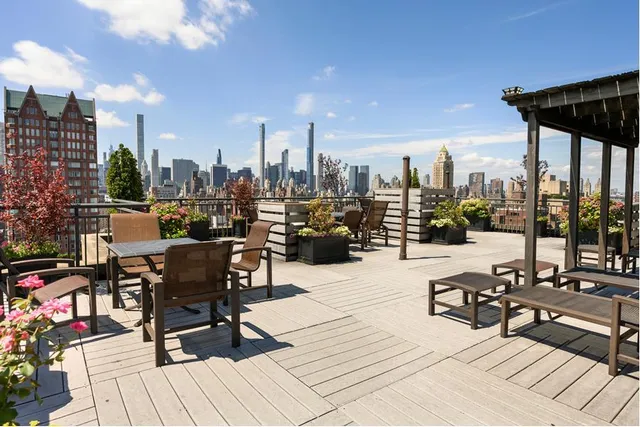 a view of a terrace with seating area