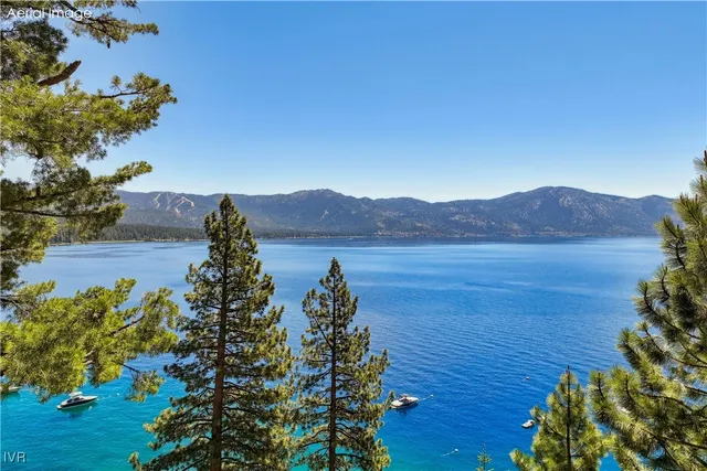 a view of a lake with a mountain in the background