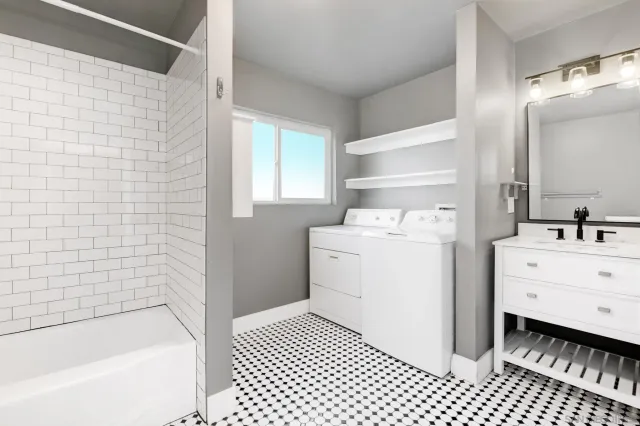 a bathroom with a sink toilet a shower and a bathtub