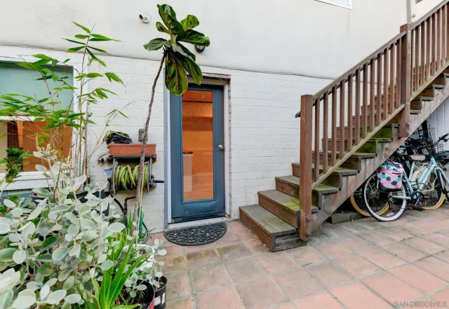 a view of a backyard of the house