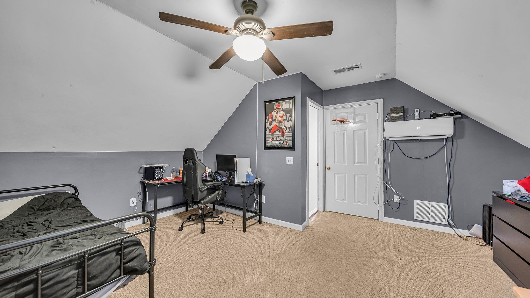 1415 Rosemark Road Atoka, TN 38004 - Photo 16 of 20 Carpeted bedroom featuring lofted ceiling and ceiling fan