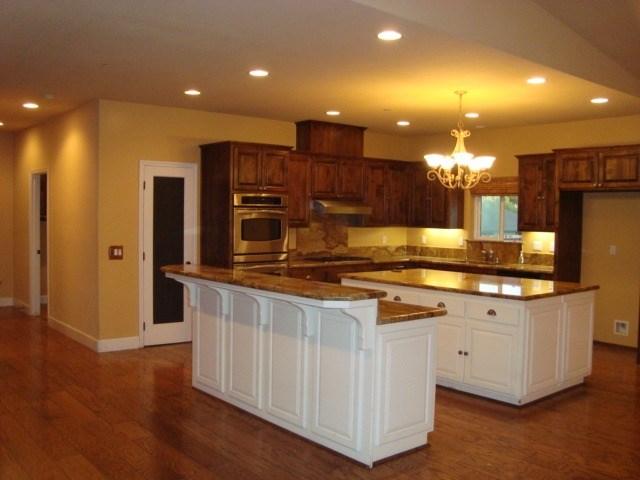 765 Alamo Pintado Road Solvang, CA 93463 - Photo 6 of 21 a kitchen with stainless steel appliances granite countertop a stove and a refrigerator