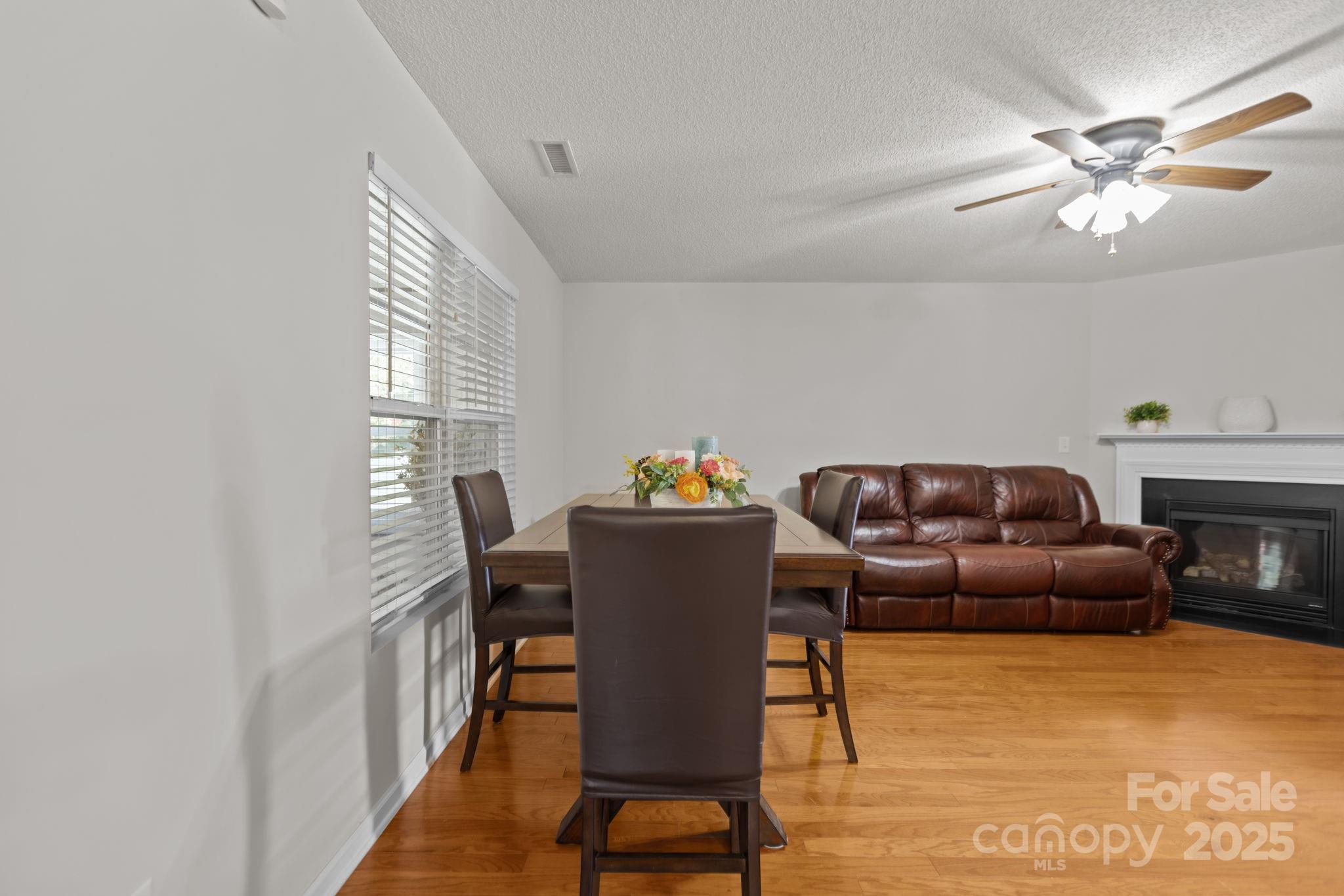 6839 Harter Court, Unit 35 Raleigh, NC 27610 - Photo 12 of 43 a living room with furniture and a fireplace