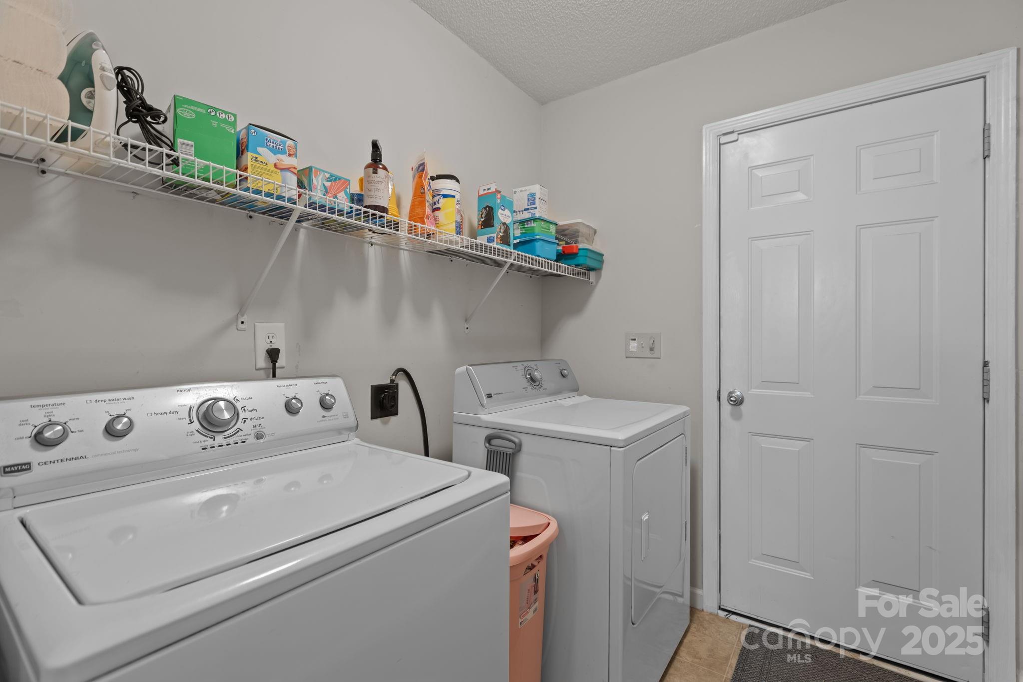 6839 Harter Court, Unit 35 Raleigh, NC 27610 - Photo 27 of 43 a utility room with dryer and washer