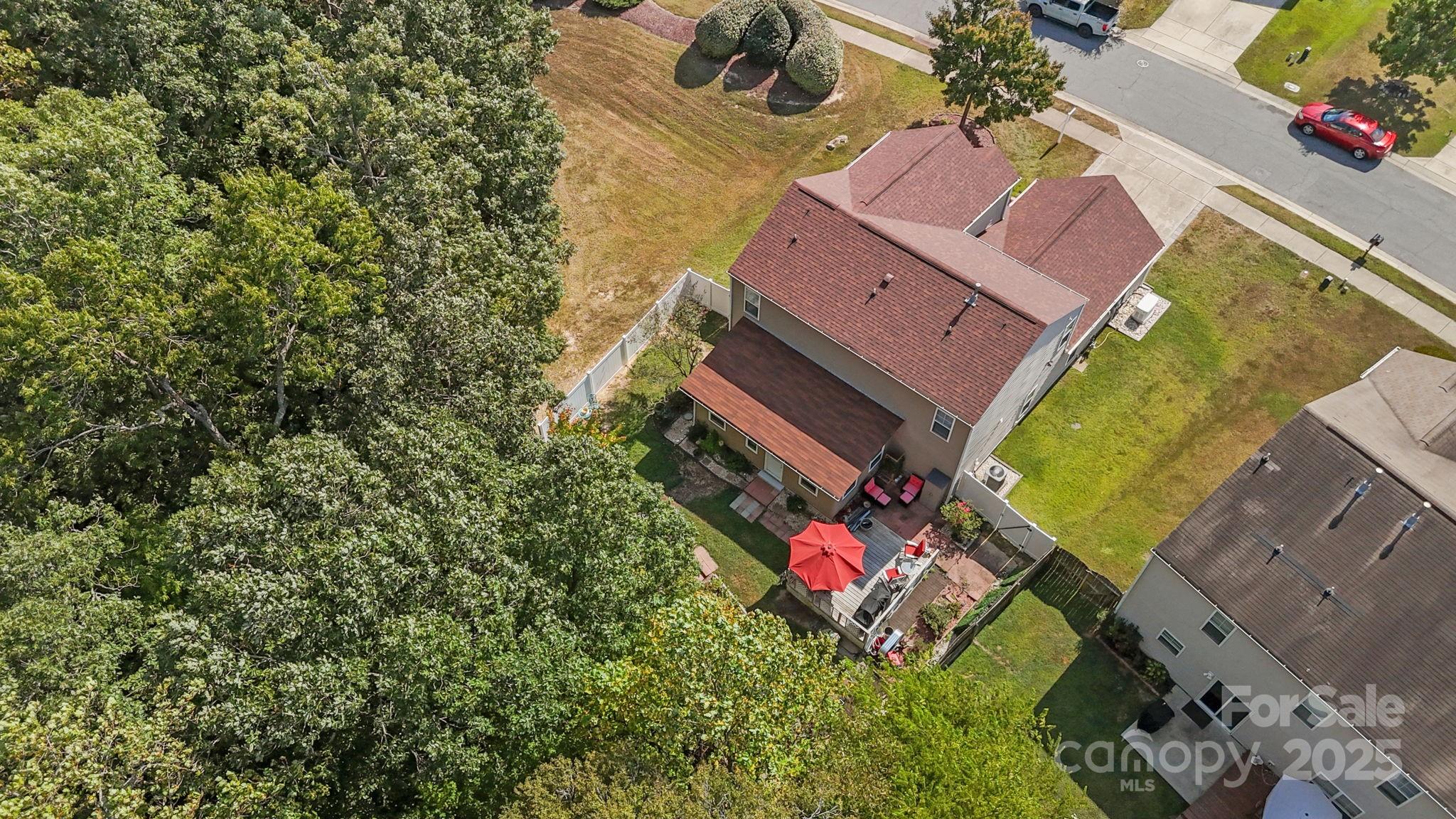 6839 Harter Court, Unit 35 Raleigh, NC 27610 - Photo 34 of 43 an aerial view of a house with a yard and swimming pool