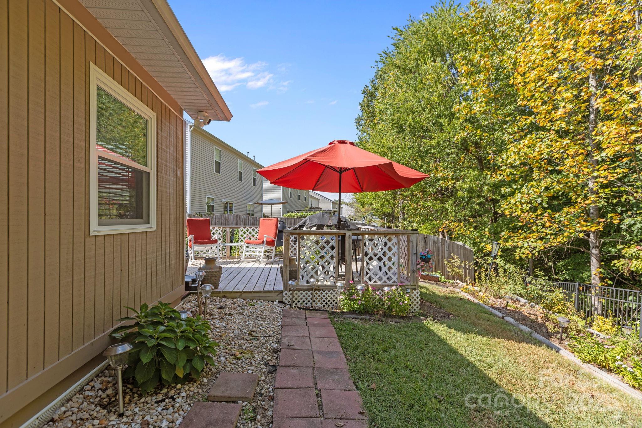 6839 Harter Court, Unit 35 Raleigh, NC 27610 - Photo 35 of 43 a view of a house with backyard and sitting area