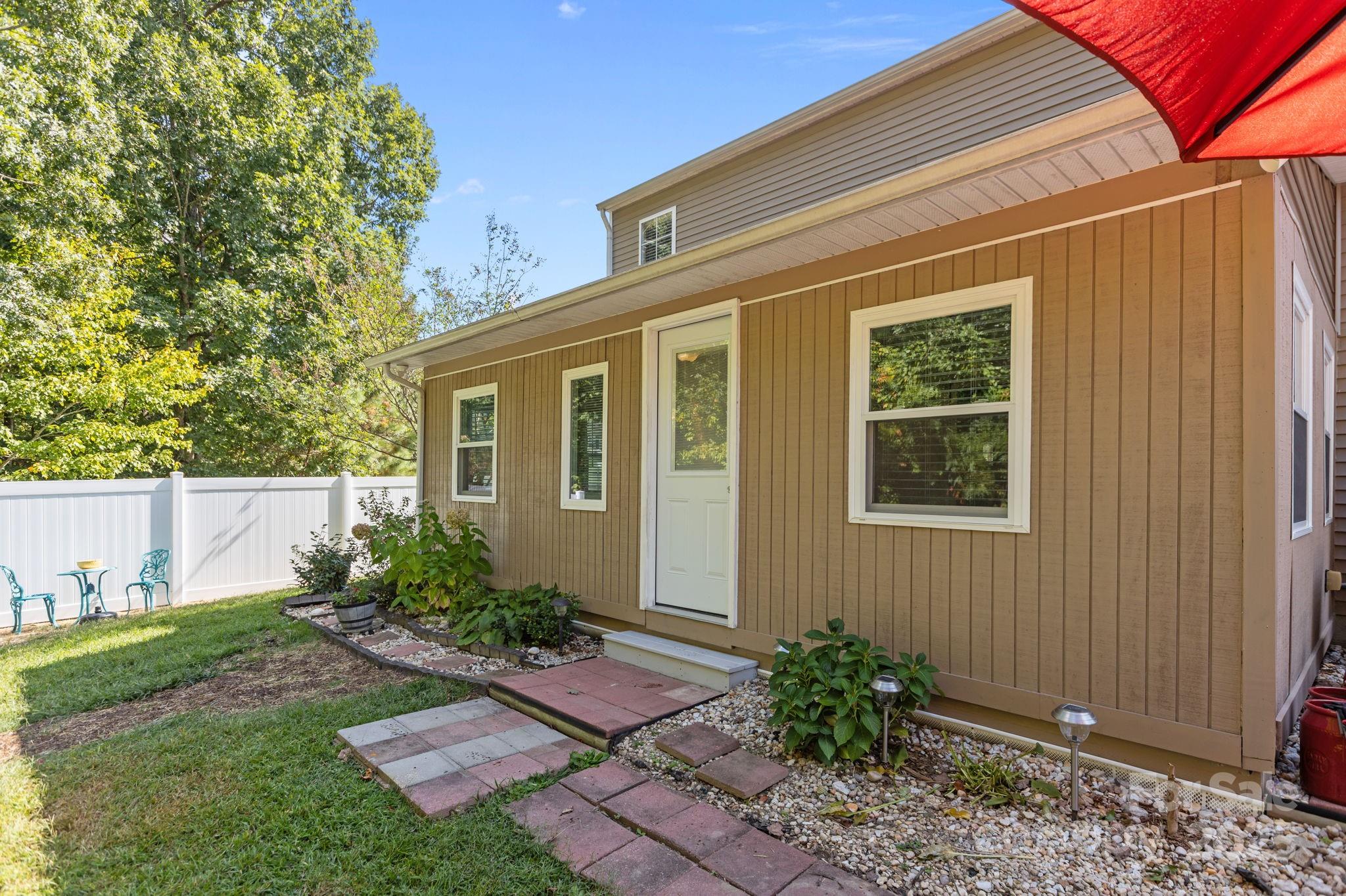 6839 Harter Court, Unit 35 Raleigh, NC 27610 - Photo 36 of 43 a front view of a house with garden