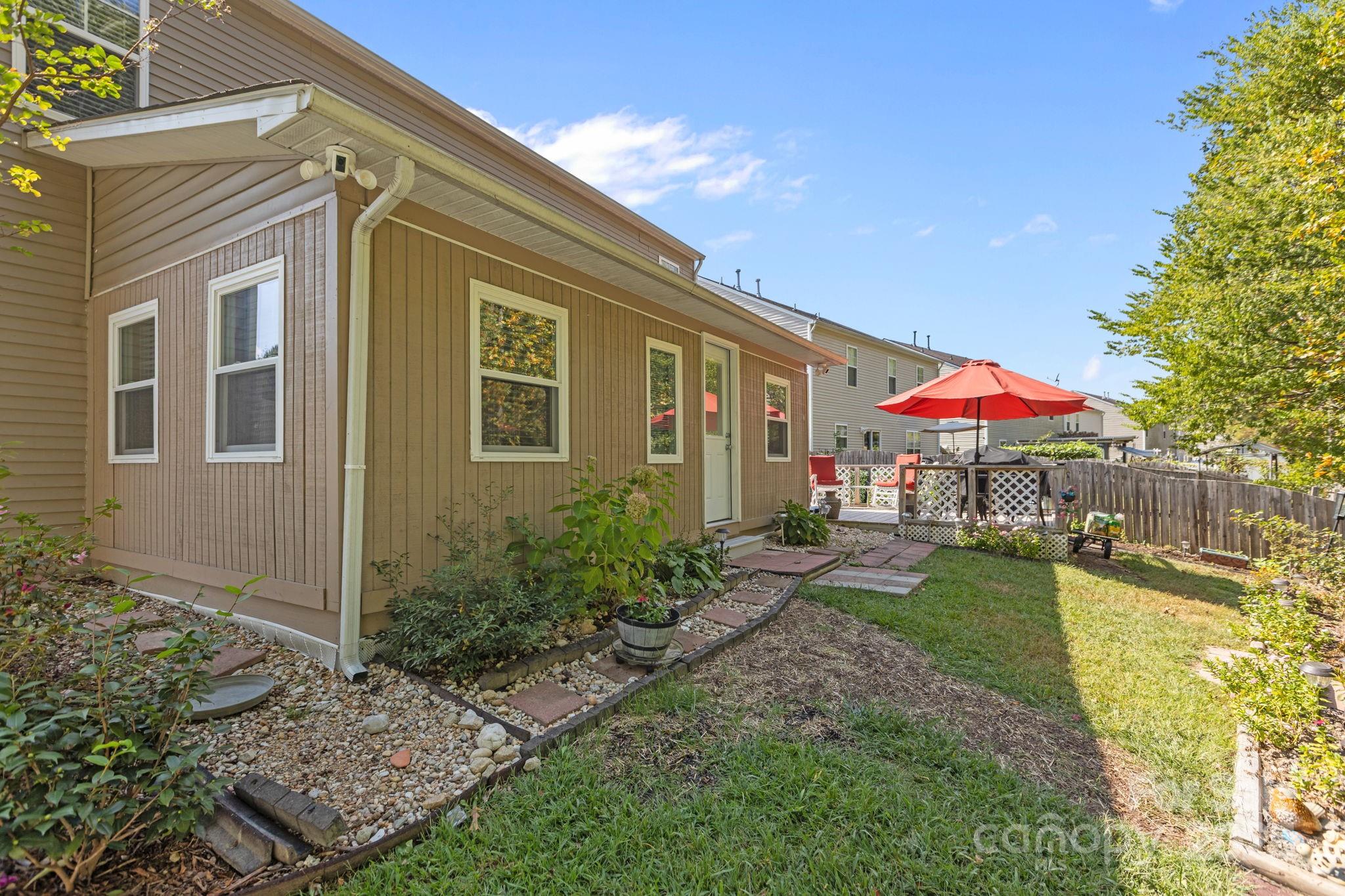 6839 Harter Court, Unit 35 Raleigh, NC 27610 - Photo 37 of 43 a view of a house with backyard and sitting area