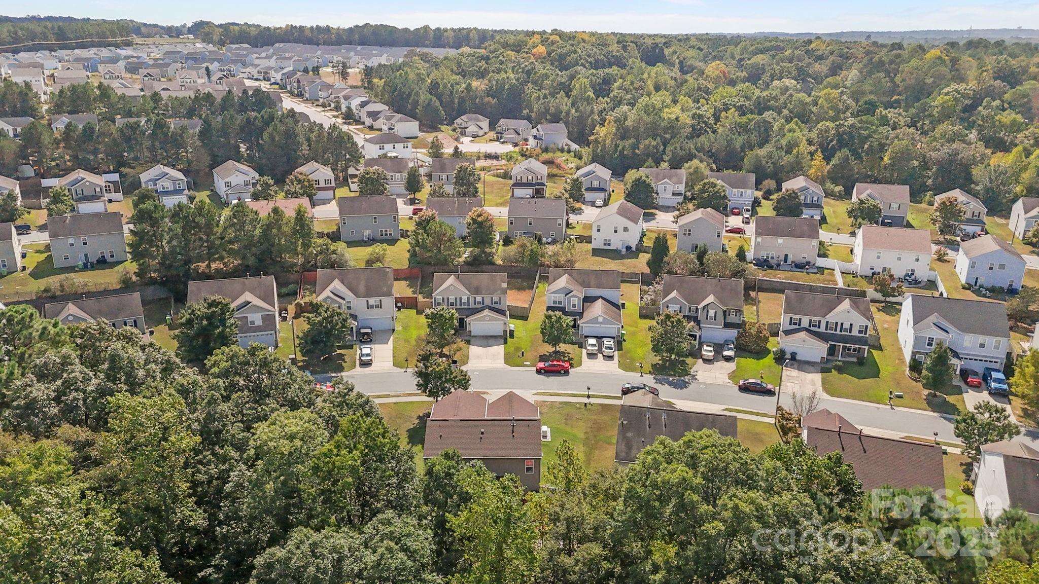 6839 Harter Court, Unit 35 Raleigh, NC 27610 - Photo 43 of 43 an aerial view of multiple house