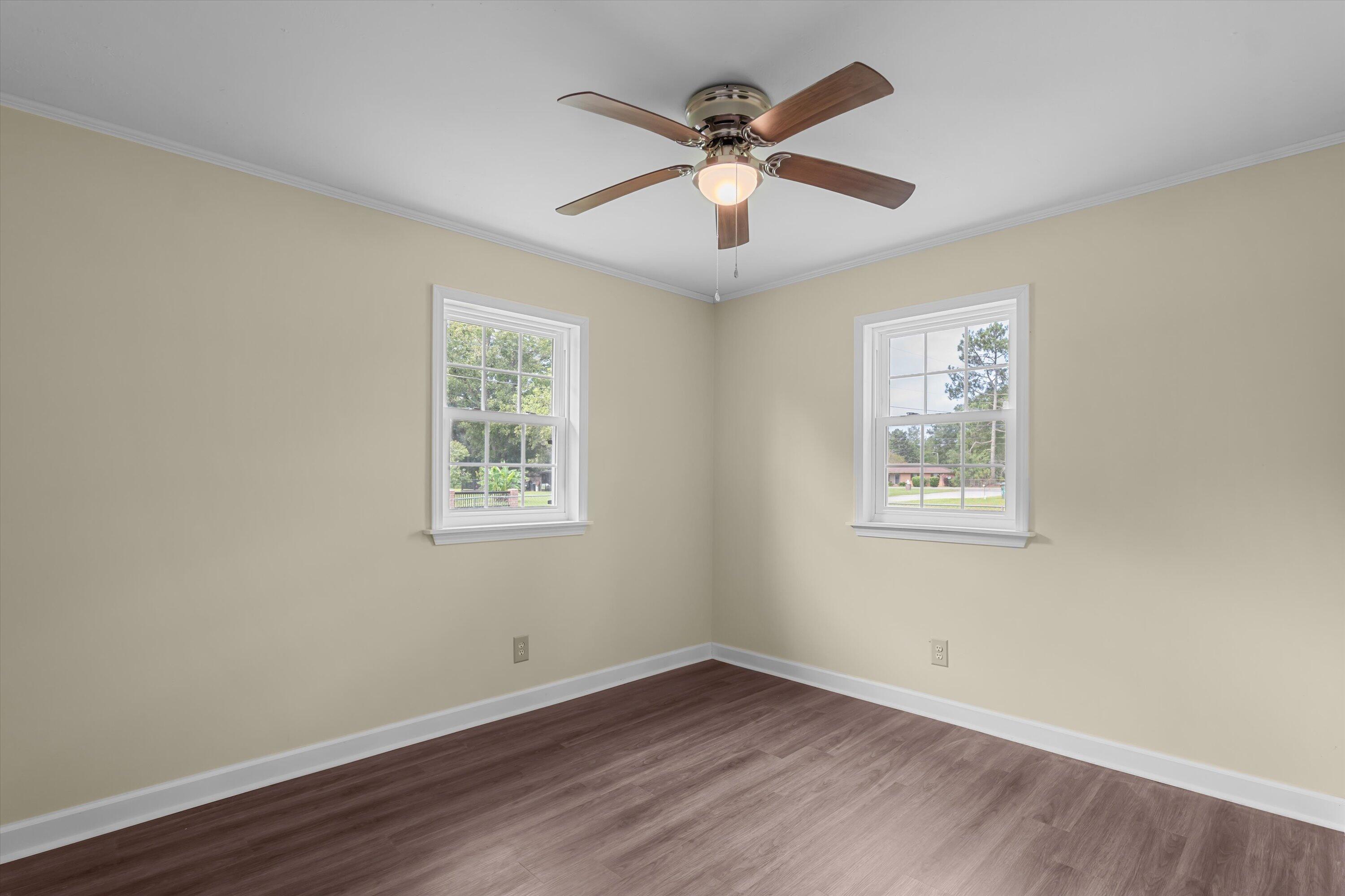 53 Ash Street Denmark, SC 29042 - Photo 22 of 32 Bedroom 3 with two windows for ample natural light