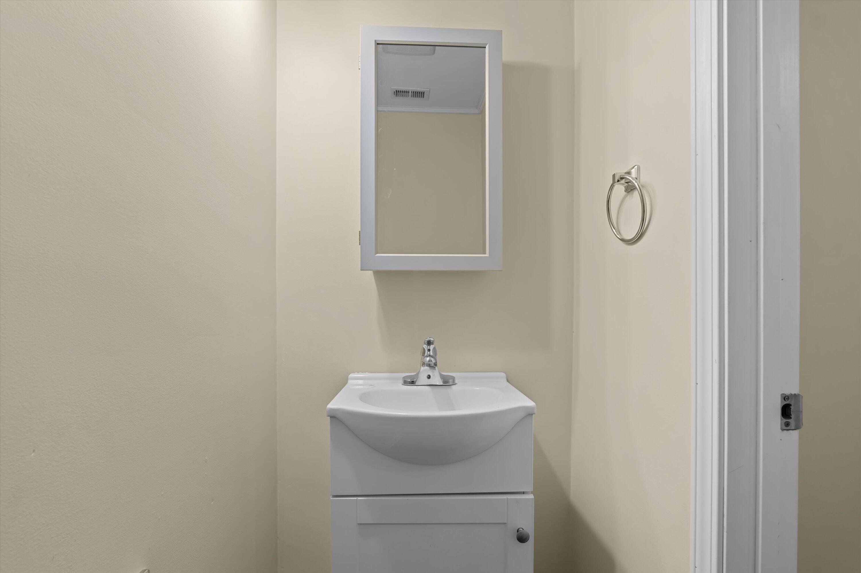 53 Ash Street Denmark, SC 29042 - Photo 25 of 32 Half bathroom in primary bedroom