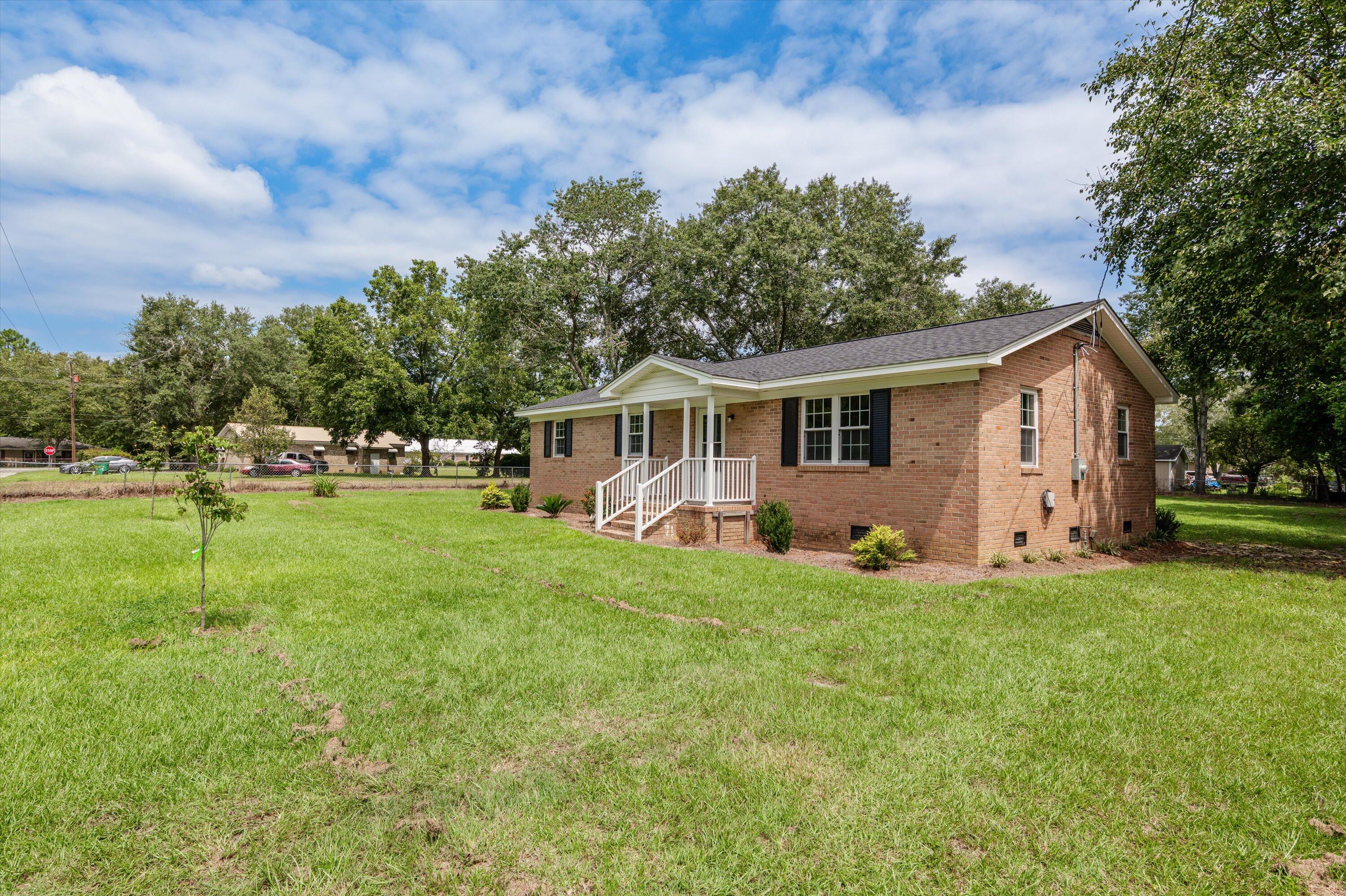53 Ash Street Denmark, SC 29042 - Photo 3 of 32 Charming brick ranch with fresh updates and inviting curb appeal