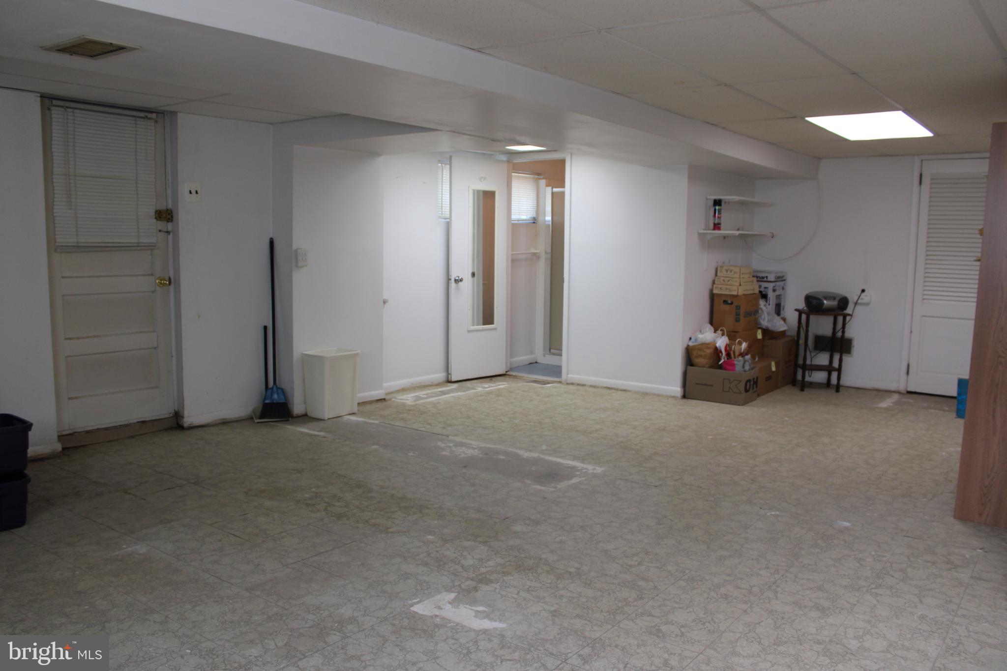 241 Acres Drive Ridley Park, PA 19078 - Photo 15 of 27 BASEMENT EXIT & FULL BATHROOM