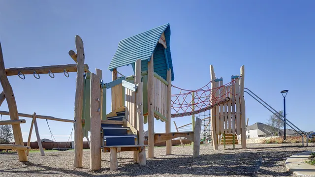 a view of outdoor space with signage and flags