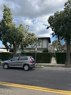 a car parked in front of a house