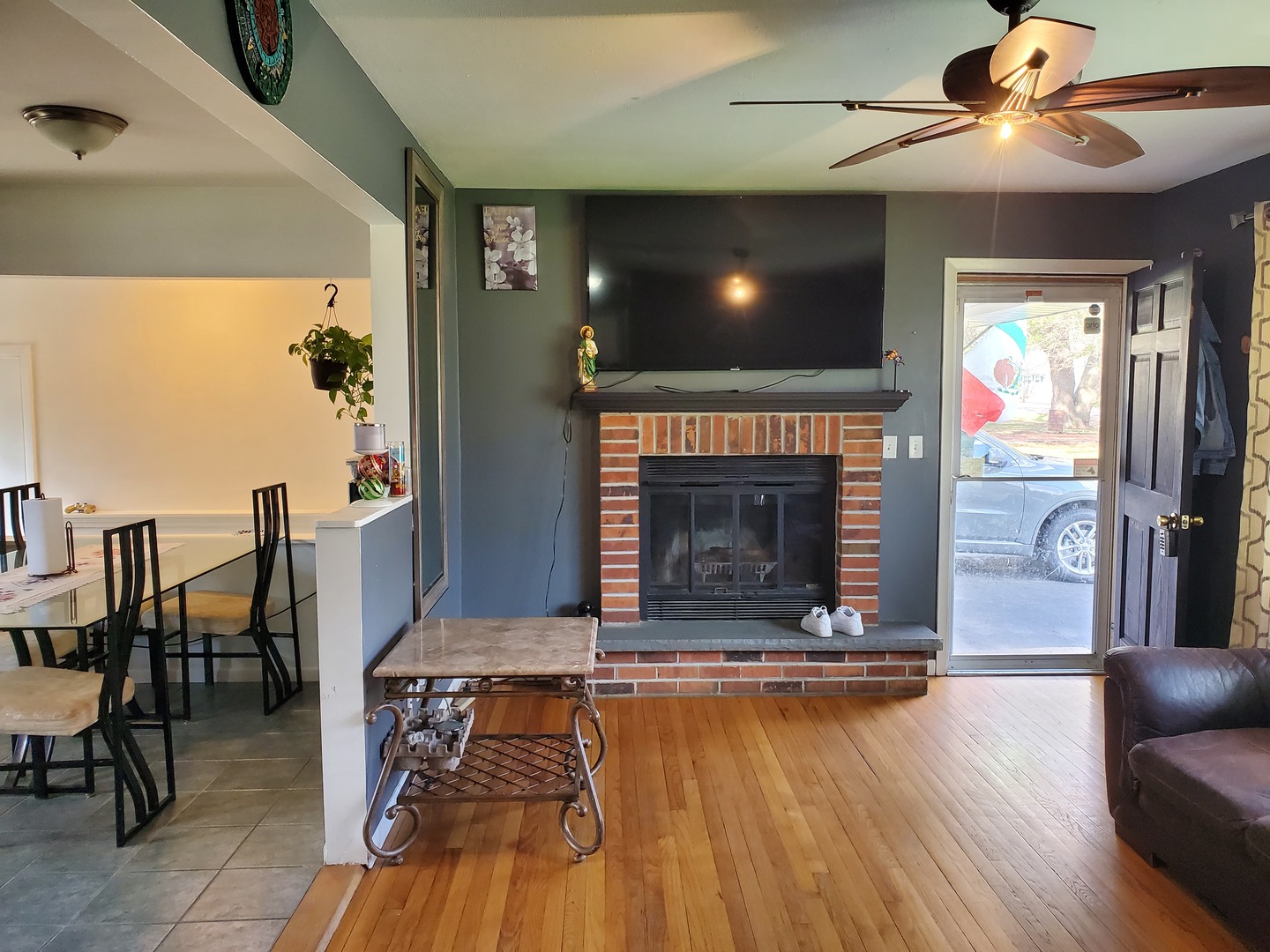 309 Kent Road McHenry, IL 60051 - Photo 5 of 25 a living room with furniture and a fireplace