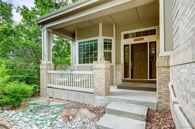 a front view of a house with a porch