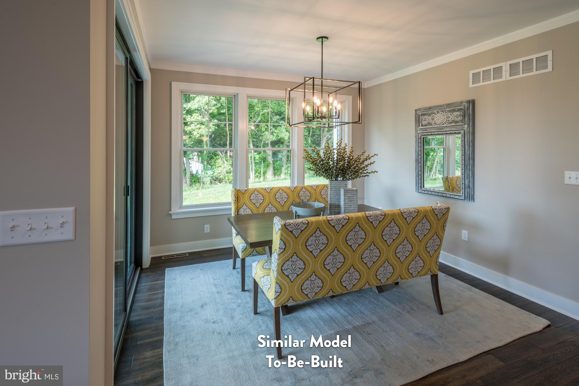 Lot#57 Patton Road Harrisburg, PA 17112 - Photo 6 of 11 a living room with furniture and a chandelier