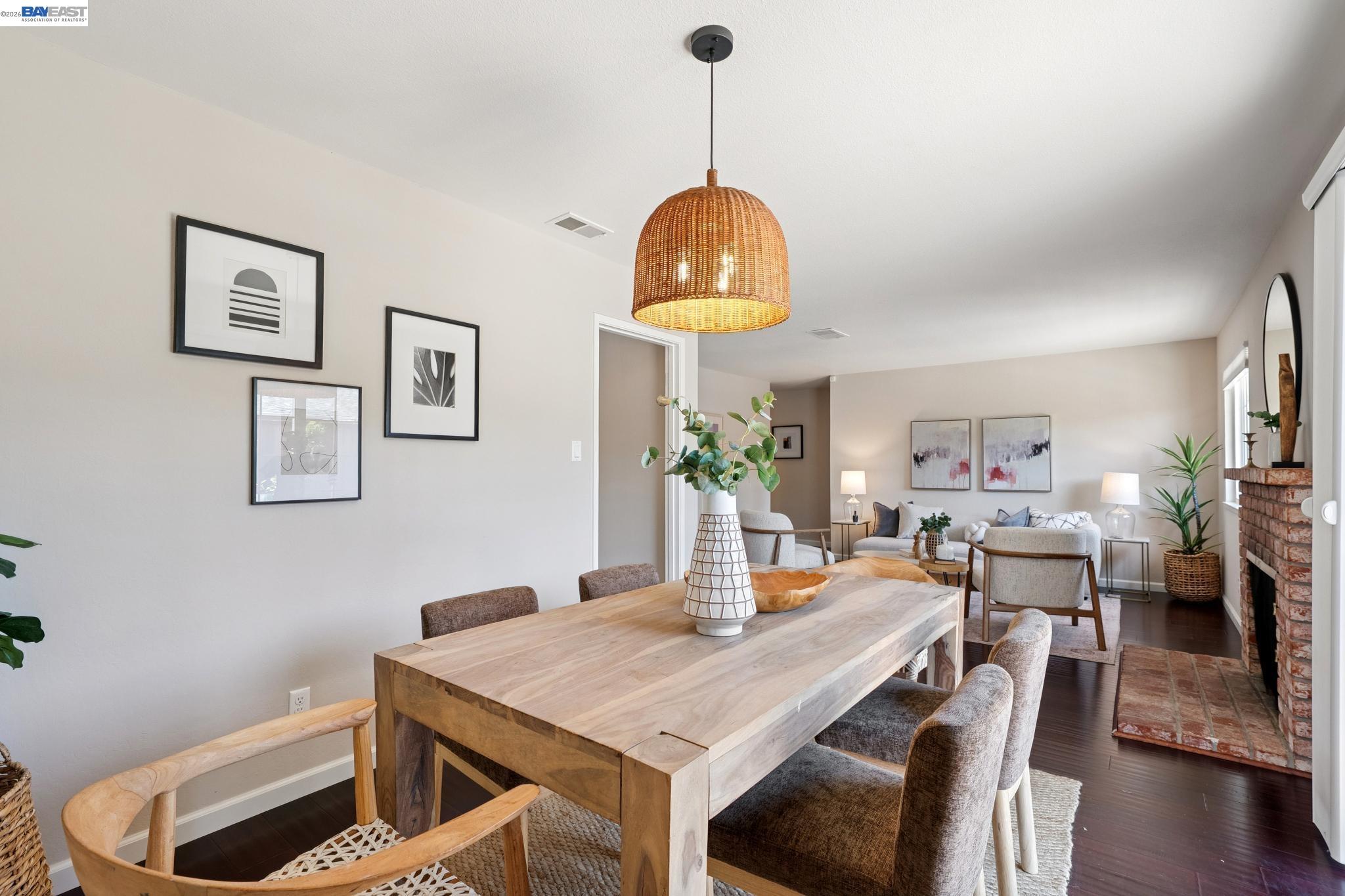 328 Sand Beach Road Alameda, CA 94501 - Photo 15 of 48 a view of a dining room with furniture and wooden floor