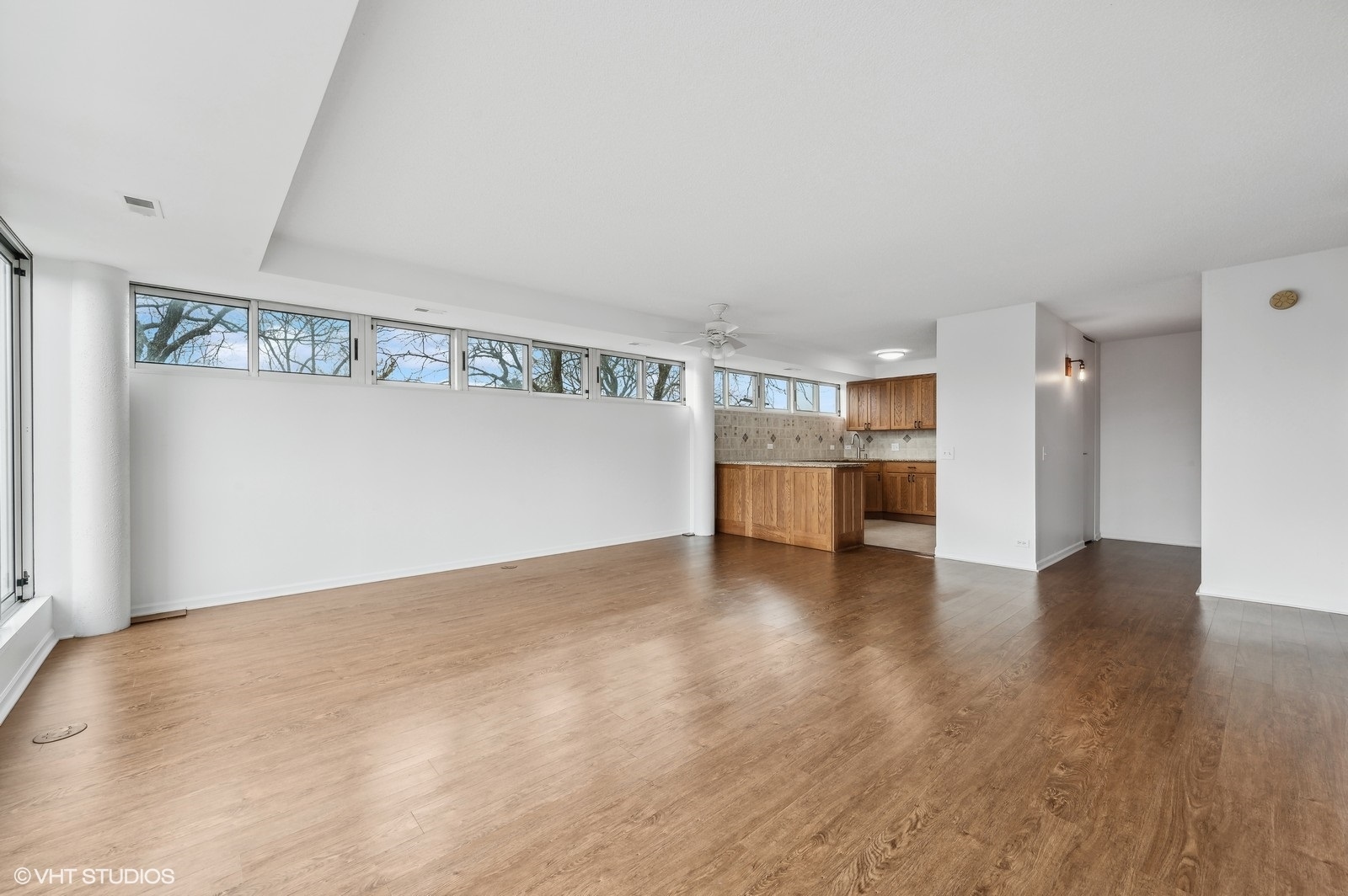 2555 Gross Point Road, Unit 305 Evanston, IL 60201 - Photo 9 of 28 a view of empty room with wooden floor