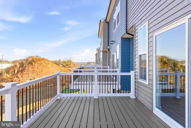 a front view of a house with glass windows