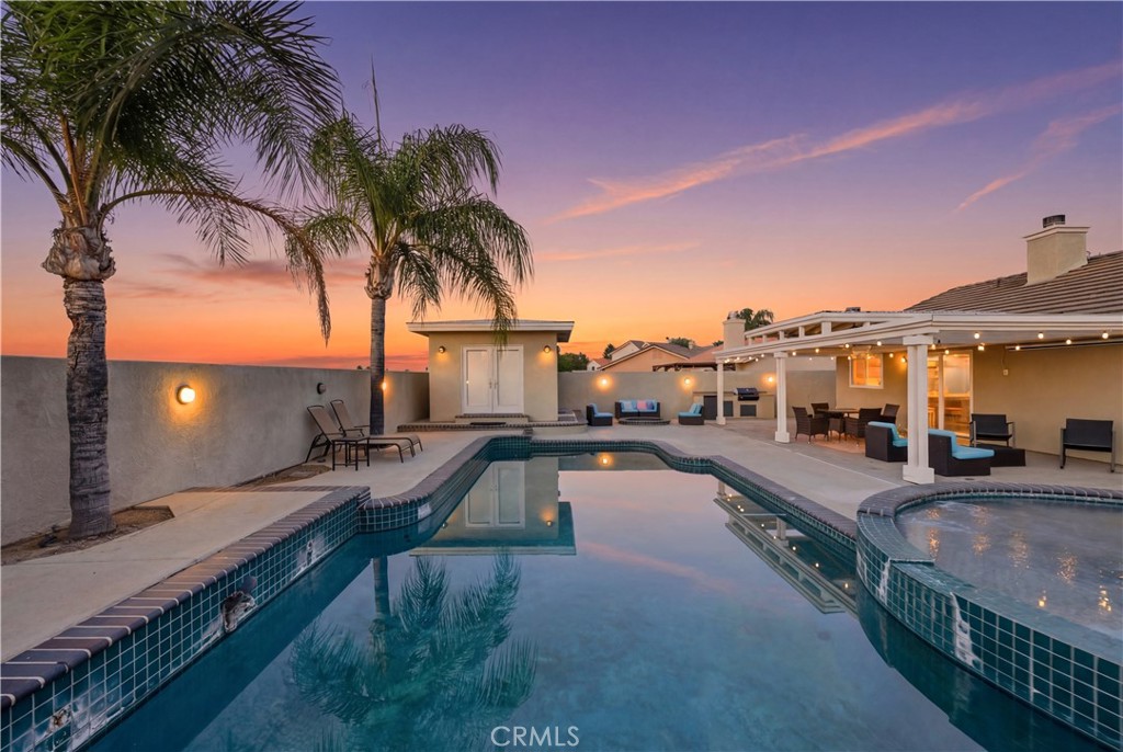 29739 Berea Road Menifee, CA 92584 - Photo 4 of 25 a view of a swimming pool with furniture