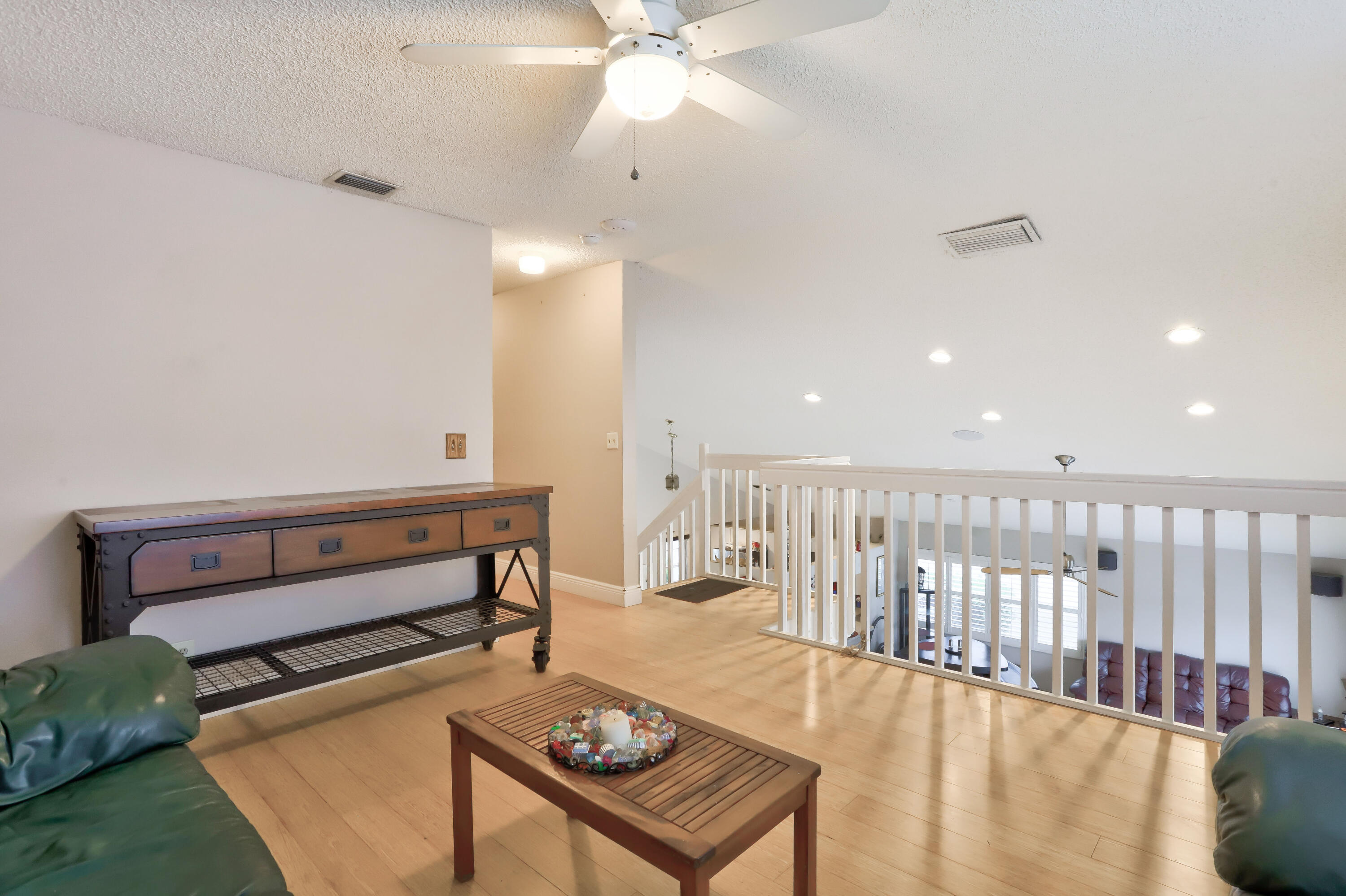 7427 Shell Ridge Terrace Lake Worth, FL 33467 - Photo 16 of 27 a view of a hallway with a couch