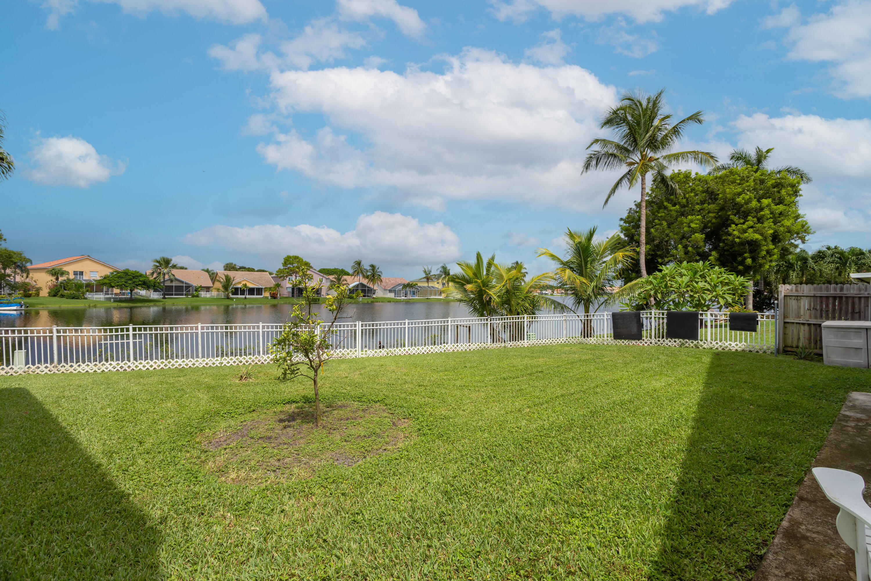 7427 Shell Ridge Terrace Lake Worth, FL 33467 - Photo 2 of 27 a view of a garden