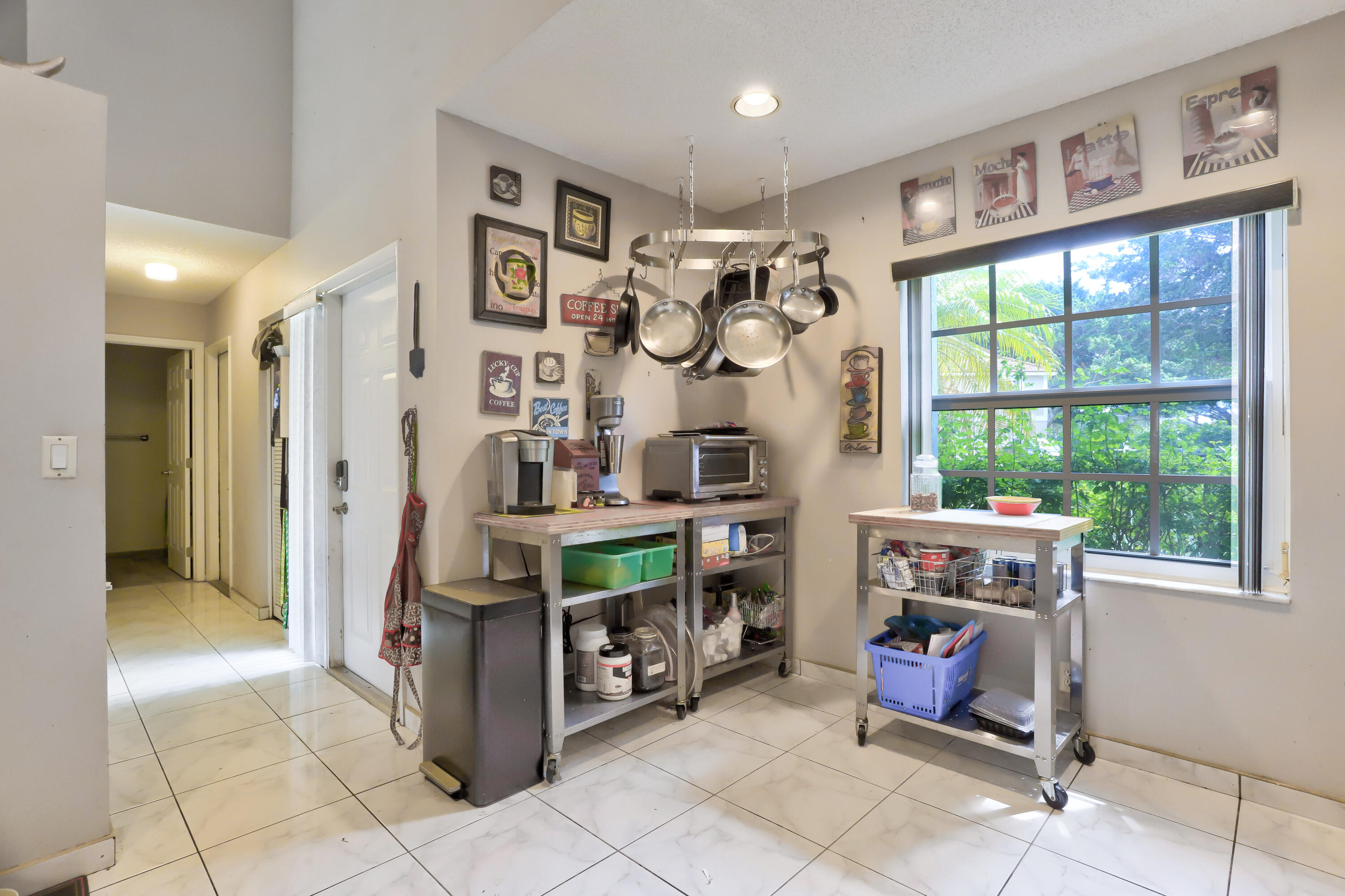 7427 Shell Ridge Terrace Lake Worth, FL 33467 - Photo 7 of 27 a very nice looking room with a large window