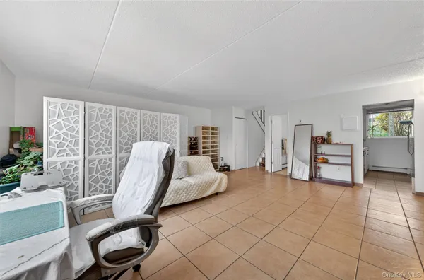 a view of a livingroom with furniture and a couch