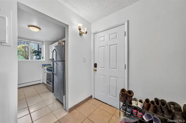 a view of a storage & utility room with a sink