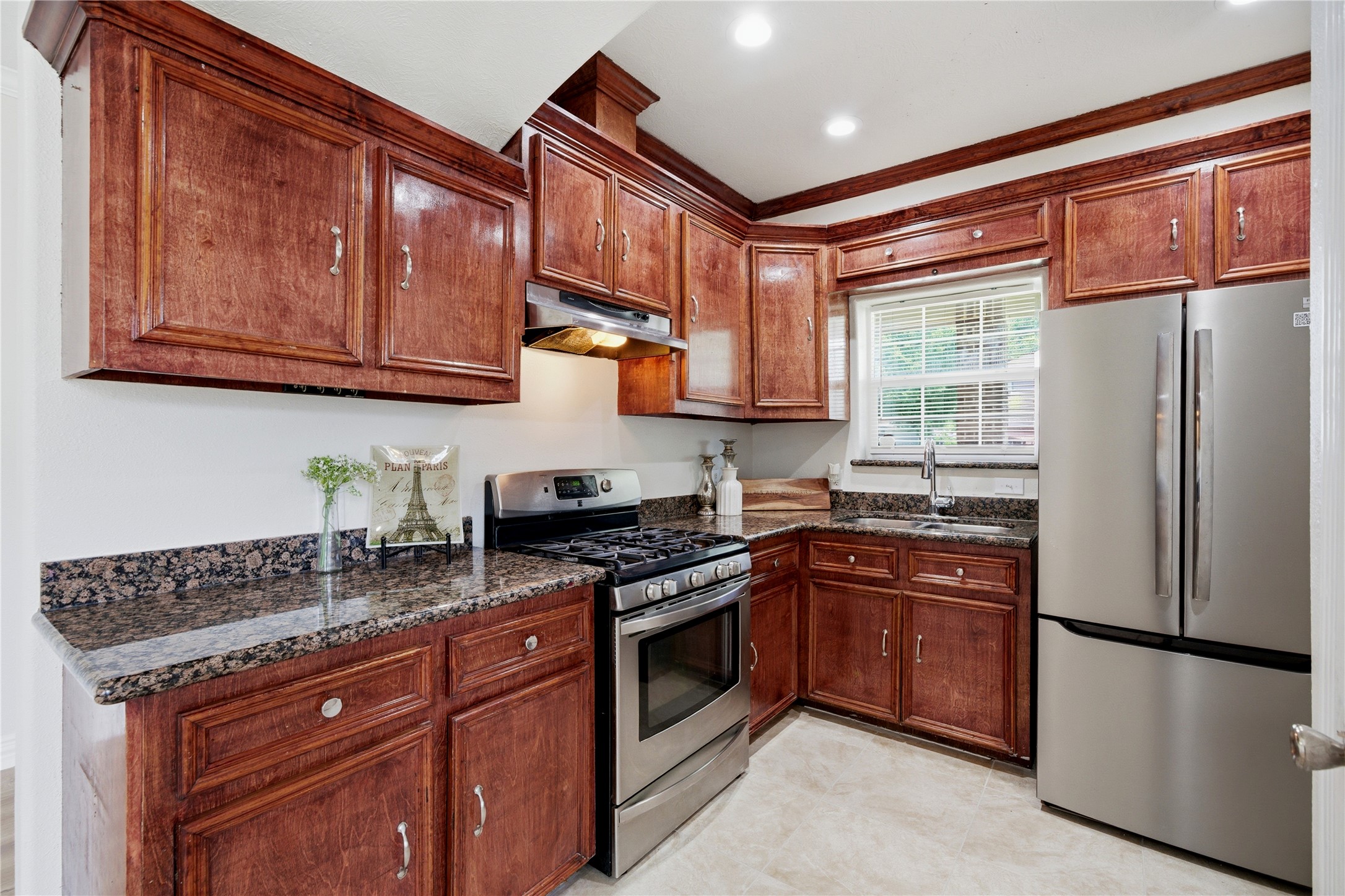 3001 Wayne Street Houston, TX 77026 - Photo 8 of 31 Granite counters and stainless steel appliances are lovely additions to this kitchen
