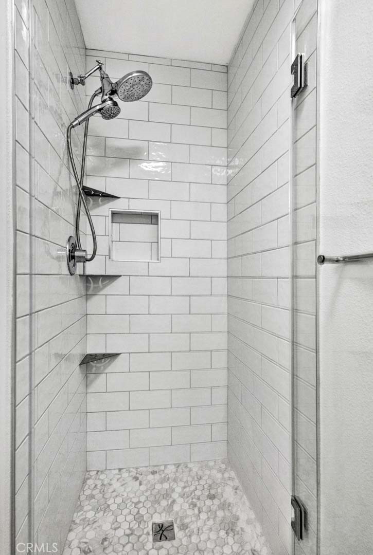 38 Windjammer, Unit 20 Irvine, CA 92614 - Photo 12 of 25 a bathroom with a shower