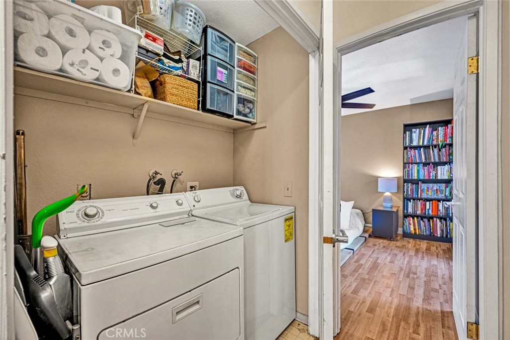 38 Windjammer, Unit 20 Irvine, CA 92614 - Photo 15 of 25 a view of storage and utility room with washer and dryer