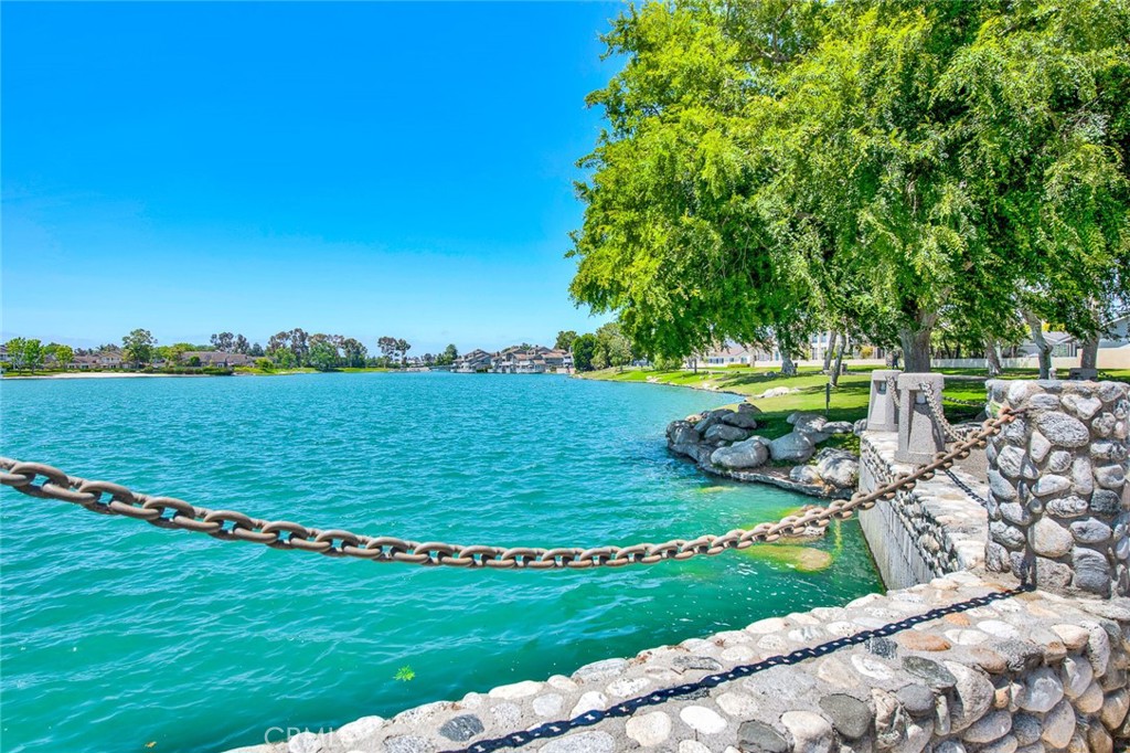 38 Windjammer, Unit 20 Irvine, CA 92614 - Photo 25 of 25 a view of a golf course with a lake