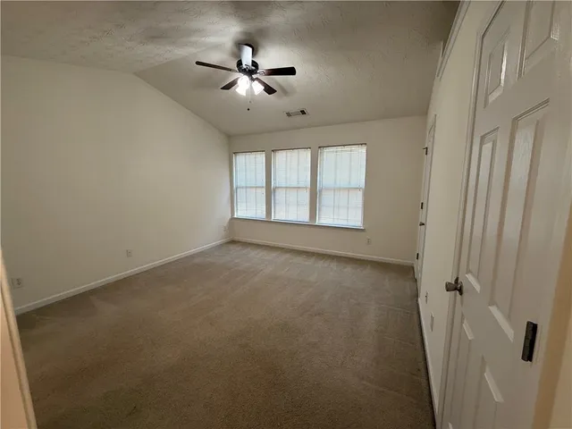 a bathroom with a double vanity sink and mirror