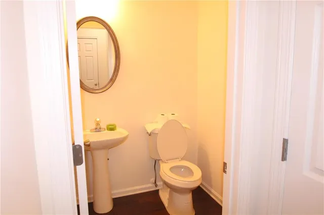 a kitchen with stainless steel appliances a refrigerator a stove and a sink