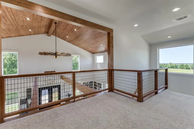 a view of a hallway with staircase