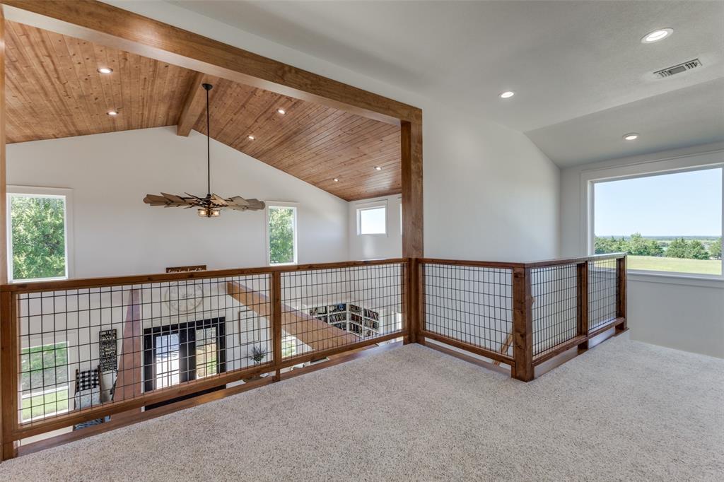 917 Marlow Road Bells, TX 75414 - Photo 15 of 40 a view of a hallway with staircase