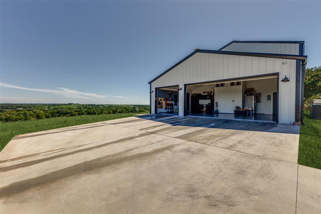 917 Marlow Road Bells, TX 75414 - Photo 25 of 40 front view of a house with a outdoor space