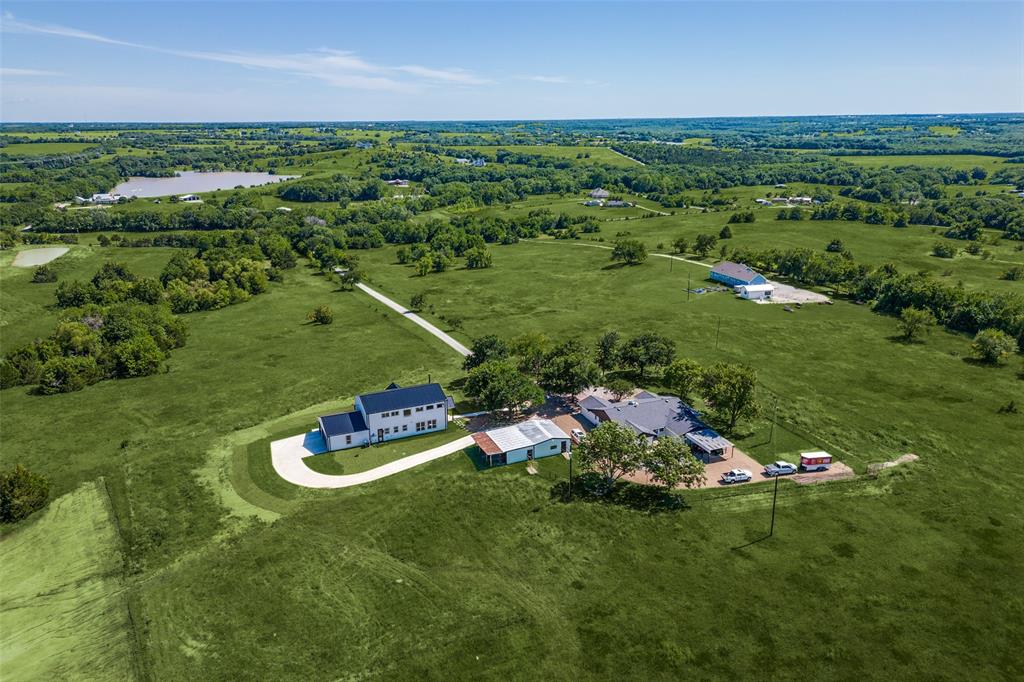 917 Marlow Road Bells, TX 75414 - Photo 4 of 40 an aerial view of a house with a yard