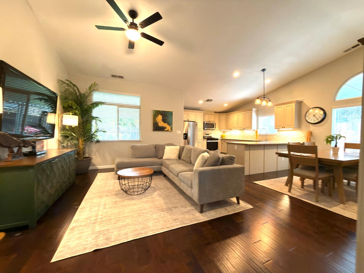 775 Oldenburg Way Galt, CA 95632 - Photo 15 of 31 a living room with couches kitchen view and a large window