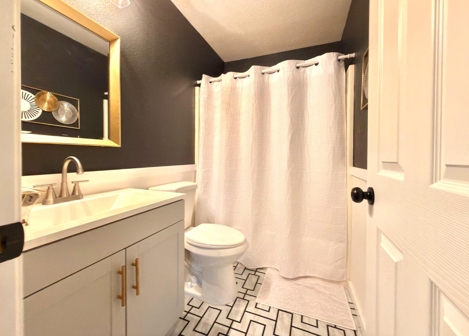 775 Oldenburg Way Galt, CA 95632 - Photo 26 of 31 a bathroom with a sink and a mirror