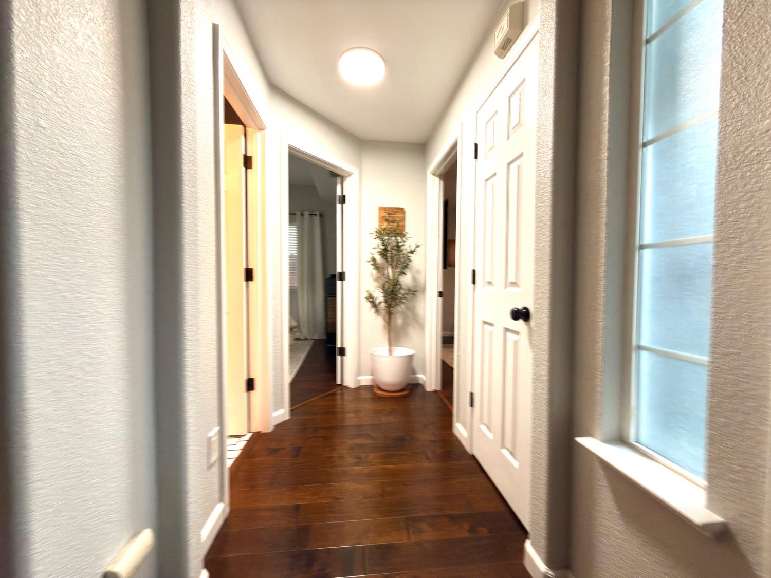 775 Oldenburg Way Galt, CA 95632 - Photo 27 of 31 a view of a hallway with wooden floor and staircase