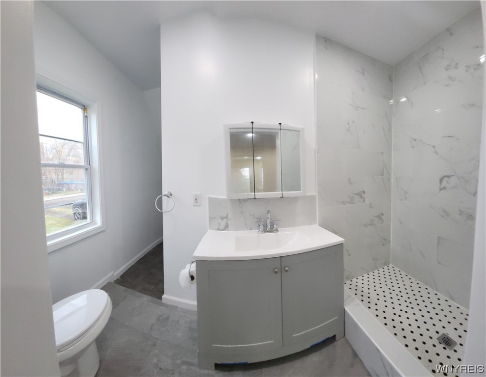 1323 West E Avenue Buffalo, NY 14213 - Photo 10 of 19 1st floor bathroom with gorgeous tile shower