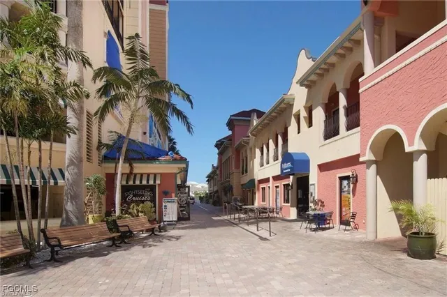 a view of a building with sitting area