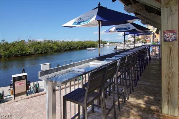 a view of a chairs and table on the terrace