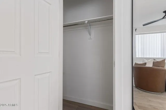 a room with a bench and dryer