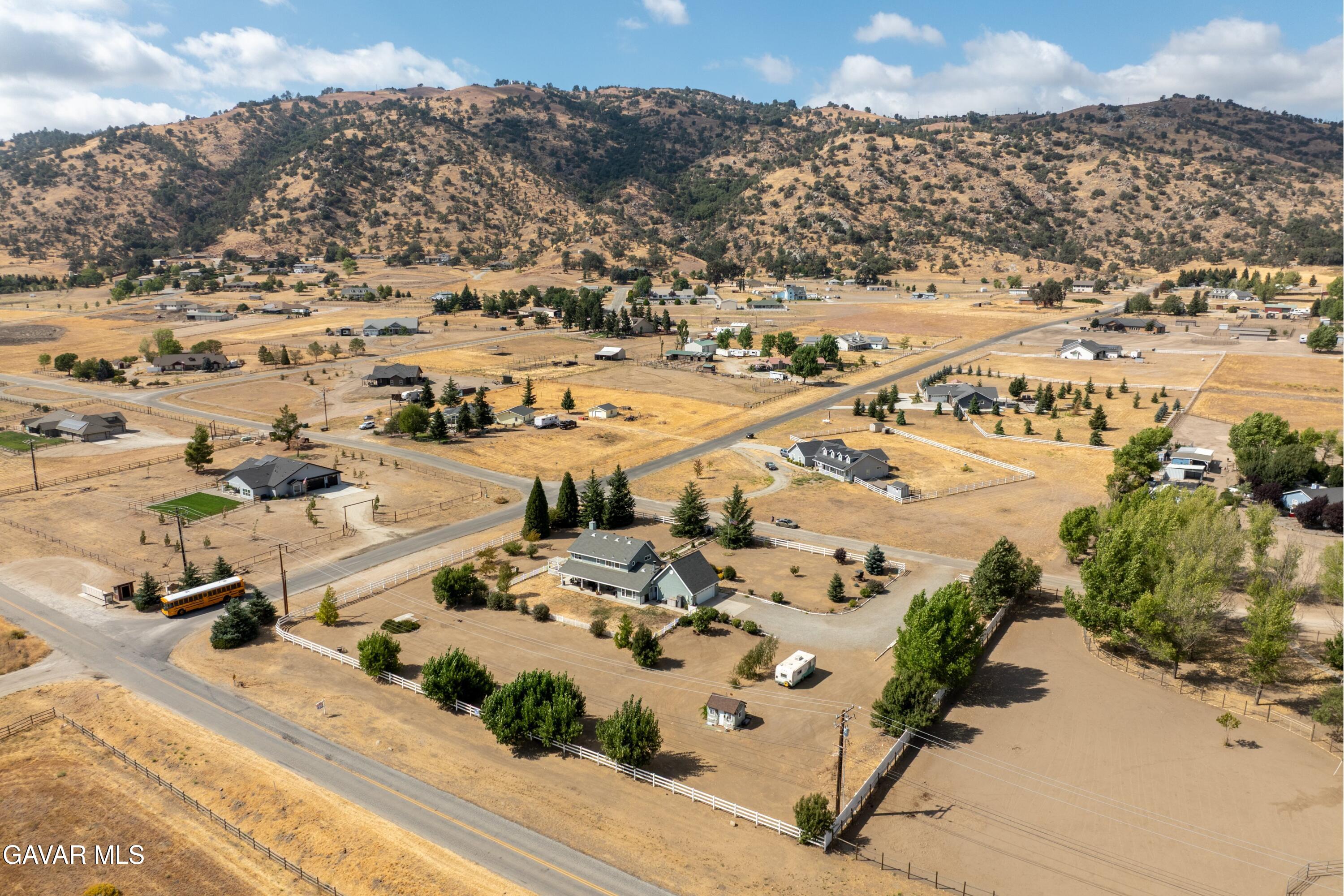 27450 Harness Drive Tehachapi, CA 93561 - Photo 32 of 44 an aerial view of residential houses with outdoor space